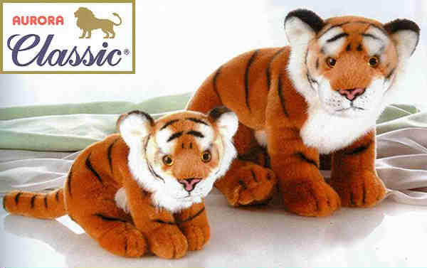 cat and stuffed tiger